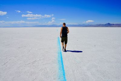 Full length of man on landscape against sky