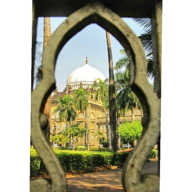 architecture, built structure, building exterior, church, place of worship, religion, dome, spirituality, arch, tree, day, cathedral, window, clear sky, city, indoors, entrance, travel destinations