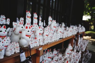 Luck cat ornaments at japanese temple