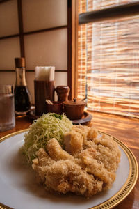 Close-up of food in plate on table