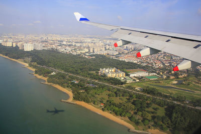 Singapore's coastline is seen from aircraft approaching landing at changi international airport