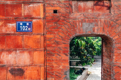 Information sign on wall of building