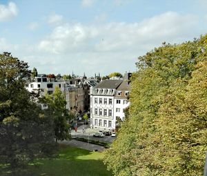 View of residential buildings against sky