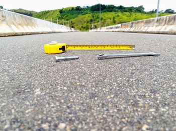 Yellow umbrella on road
