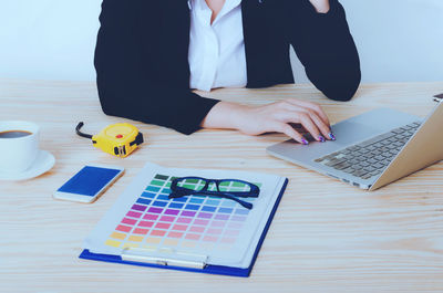 Man using laptop on table