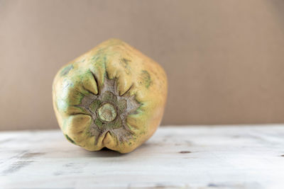 Close-up of lemon on table