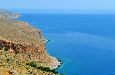 Scenic view of sea against cloudy sky