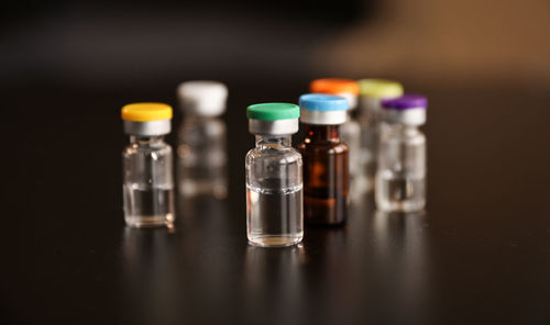 Close-up of bottles on table