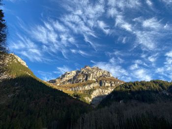 View of mountain range against cloudy sky