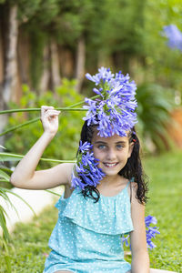 Portrait of a little girl on a garden