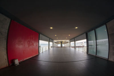 Illuminated corridor of building