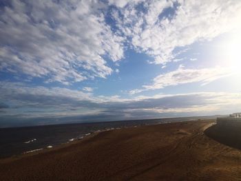 Scenic view of beach against sky