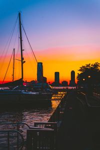 Silhouette of suspension bridge during sunset