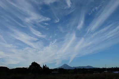View of landscape against cloudy sky