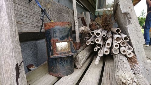 Close-up of rusty stack of wood