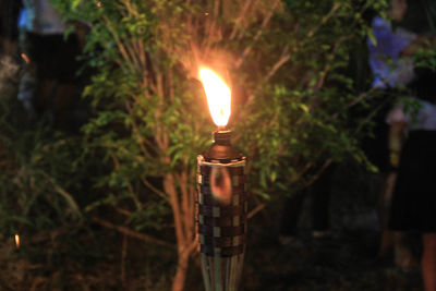 Close-up of illuminated lamp against blurred background