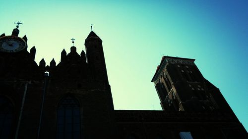 Low angle view of church against blue sky