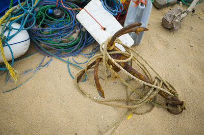 High angle view of fishing net on beach