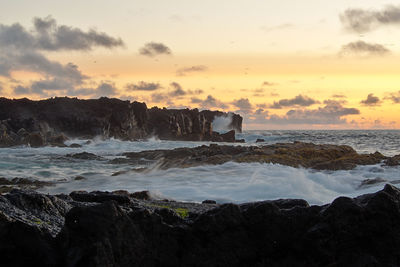 Scenic view of sea against sky during sunset