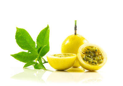 Close-up of fruits against white background