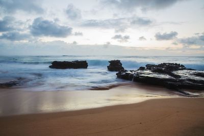 Scenic view of beach against sky