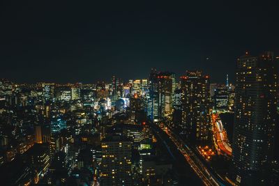 Illuminated cityscape at night