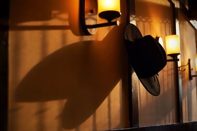 Close-up of illuminated lamp hanging at home