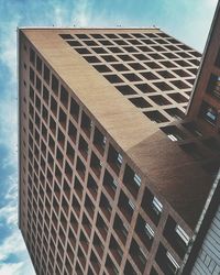 Low angle view of modern building against sky