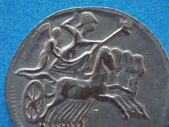 Close-up of carving on metal