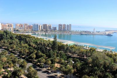 Panoramic view of city against sea