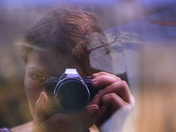 Portrait of man photographing