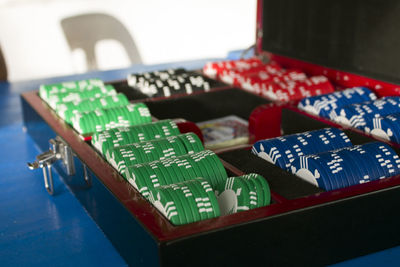 Close-up of gambling chips on table