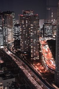 High angle view of illuminated cityscape at night