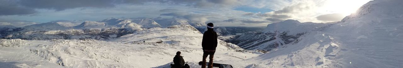 Scenic view of snow covered mountains