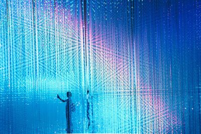 Full frame shot of illuminated lighting equipment at night