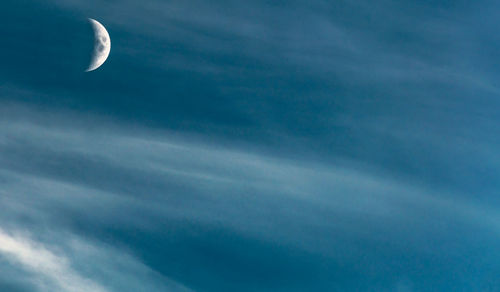 Low angle view of moon in sky