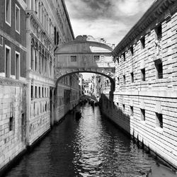 View of canal along buildings