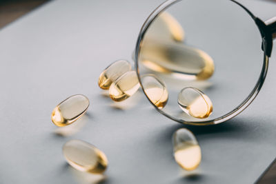 High angle view of wedding rings on table