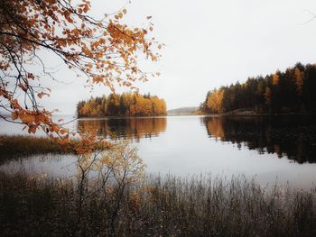 Scenic view of lake against sky during autumn