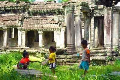 Rear view of people in traditional clothing