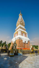 View of temple building against clear blue sky