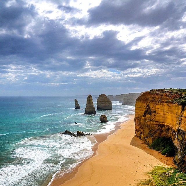 sea, horizon over water, sky, water, beach, cloud - sky, rock - object, scenics, tranquil scene, shore, tranquility, beauty in nature, cloudy, cloud, nature, rock formation, coastline, cliff, idyllic, rock