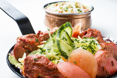 Close-up of food served on table