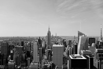 Modern buildings in city against sky