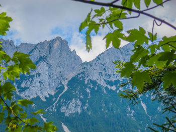 Close-up of mountain against blue sky