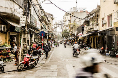 People on street in city