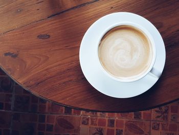High angle view of cappuccino on table