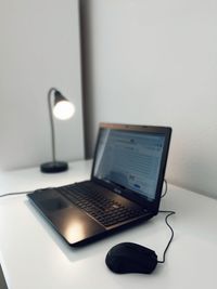 Close-up of laptop on table