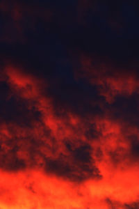 Low angle view of dramatic sky at sunset