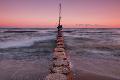 Scenic view of sea against sky during sunup